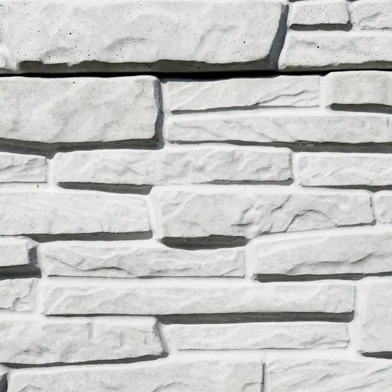 Textura Heritage Stone branco em betao cinzento, aproximacao